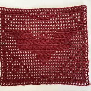 Crocheted bat tapestry made with thread like fiber